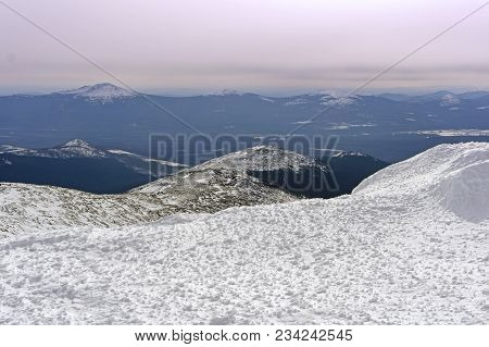 Soft Landscape Of The Northern Urals With Pinkish Sunset Sky, Mountain Peaks And Relief Firn Field I