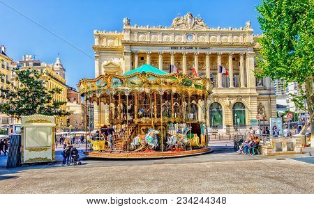 Marseille, France, April 2017 One Of The City Square With A Merry-go-round And The 