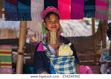 Chiang Rai, Thailand, November 04 2017, Pretty Long Neck Woman From Karen Tribe With Baby