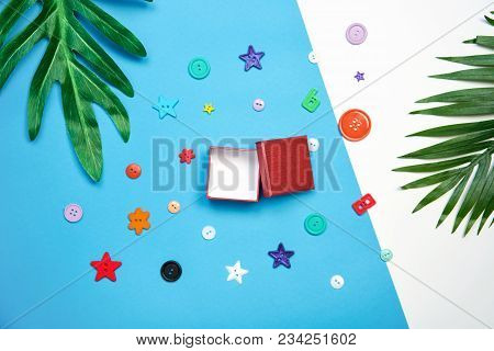 Top View Red Gift Box Empty And Colorful Clasper On Pastel Background, Copy Space For Placing Text.