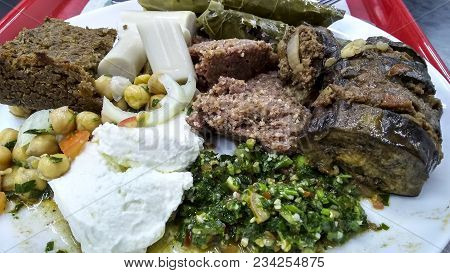 Delicious Arabian food on a plate with many varieties