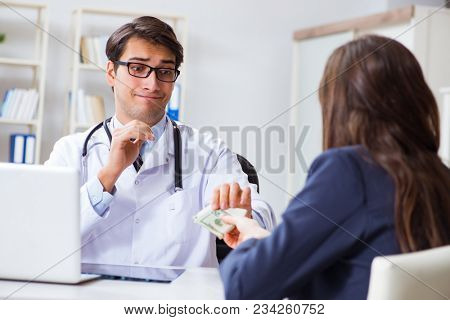 Doctor in corruption concept with being offered bribe