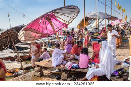 October 14,2017.Varanasi,India.  Diverse group of people are sitting and making different types of a