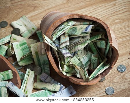 Money Box With Banknotes & Coins