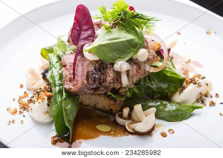 Prepared Roastbeef Served With Vegetables And Herbs On A Bread