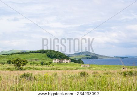 The Far Eastern Landscape Of One Of The Picturesque Bays Of The Krabbe Peninsula And Field And Ruins