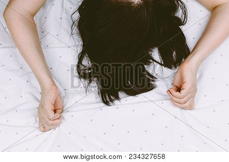 Hand Sign Orgasm Of Woman On White Bed