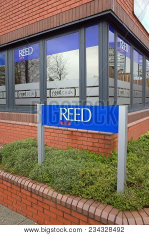 Bracknell, England - April 02, 2018: Sign Outside The Offices Of The Reed Uk Company In Bracknell, B