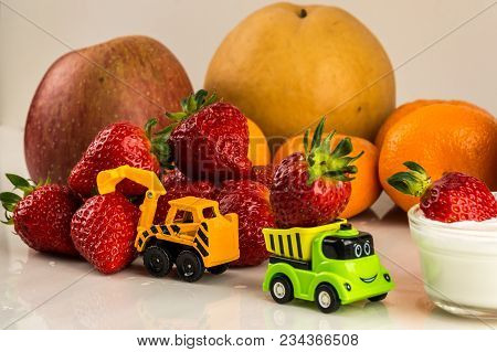 Toy Dump Truck And Excavator Carry Fruits, Strawberrys, Apples, Pears And Oranges