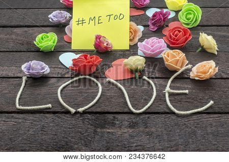 Me Too Message Written In A Yellow Paper On A Love Knoted Background.