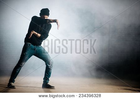 Young Male Doing Motions With Arms.practising Tecktonik. Art Skills