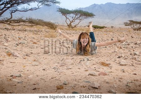 Girl Have Fun In Desert In A Summer Day
