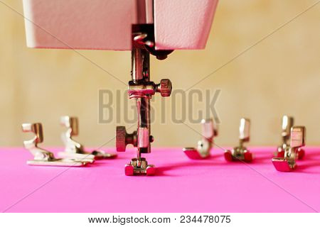 Group Of Sewing Machine Accessories. Various Presser Feet Are Used For Different Tasks And Stem Type