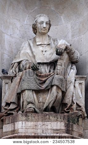 PARIS, FRANCE - JANUARY 04: The statue of Massillon by Jacques Fauginet, Fountain of the Sacred Orators, Place Saint Sulpice in Paris, France on January 04, 2018.