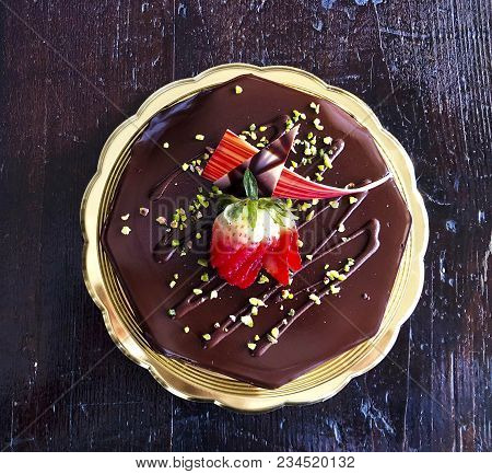 Delicious Chcocolate Cakes Covered With Sugar Icing