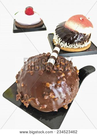 Delicious Chcocolate Cakes Covered With Sugar Icing
