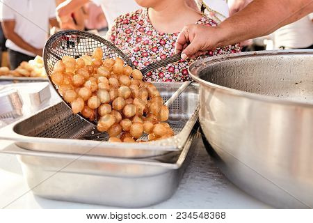 A Pile Of Deep Fried Sweet Potato Dough Balls Traditional Turkish And Cipriot Food