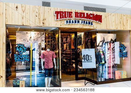 Indianapolis - Circa April 2018: True Religion Brand Jeans Retail Mall Location. True Religion Sells