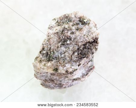 Macro Shooting Of Natural Mineral Rock Specimen - Rough Apatite ( Ore Of Phosphorus) Stone On White 