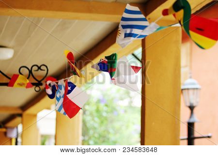 National Flags Hanging In The Building Used To Decorate.