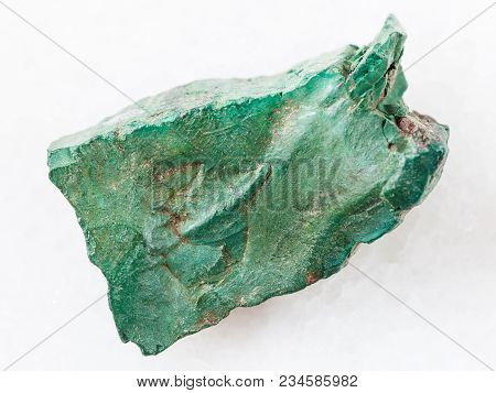 Macro Shooting Of Natural Mineral Rock Specimen - Rough Volkonskoite Stone On White Marble Backgroun