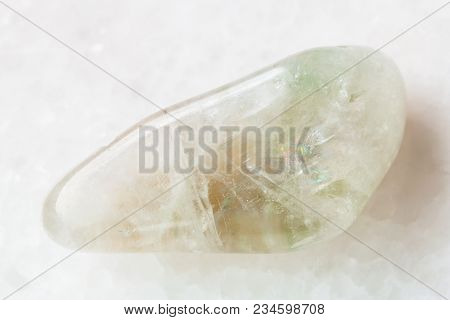 Macro Shooting Of Natural Mineral Rock Specimen - Tumbled Prasiolite (green Quartz) Gemstone On Whit