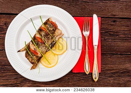 Close Up Plate With Pike Perch Fillet, Lemon, Tomato And Asparagus. Healthy Diet Concept