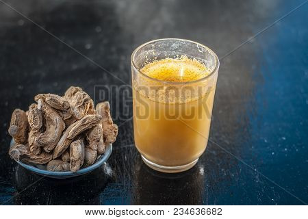 Dried Ginger Or Zingiber Officinale Or Soth,sonth With Ayurvedic Medicinal Extracted Juice In A Tran