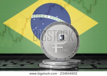 Petro (ptr) Cryptocurrency; Coin El Petro On The Background Of The Flag Of Brazil
