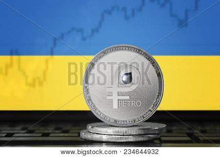 Petro (ptr) Cryptocurrency; Coin El Petro On The Background Of The Flag Of Ukraine (ua); National Ve