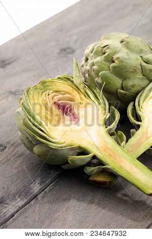Artichokes On Grey Background. Fresh Organic Artichoke Flower.