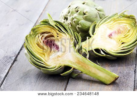 Artichokes On Grey Background. Fresh Organic Artichoke Flower.
