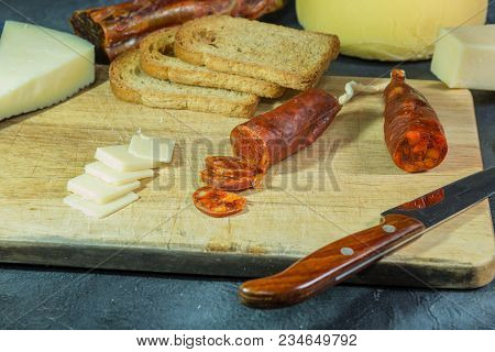 Chorizo Sausage With Parmesan Cheese Bread And Wine