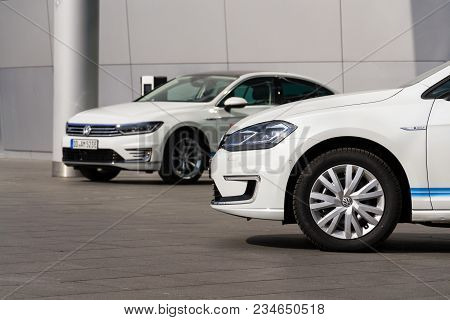 Dresden, Germany - April 2 2018: Plug-in Hybrid Electric Car Volkswagen Golf Gte Stands By Charging 