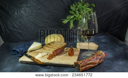 Chorizo Sausage With Parmesan Cheese Bread And Wine