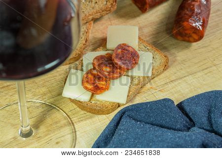 Chorizo Sausage With Parmesan Cheese Bread And Wine