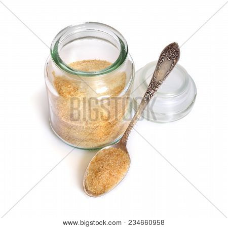 Gelatin Or Gelatine In The Glass Jar. On White Background.