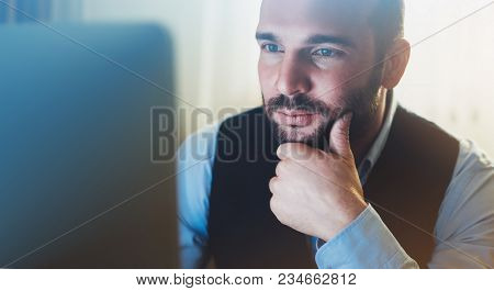 Bearded Young Businessman Working On Modern Office. Consultant Man Thinking Looking In Monitor Compu