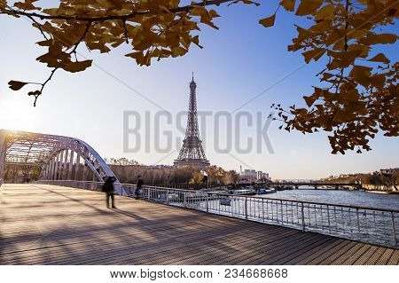 Couple Capturing Picture On The Debilly Bridge Against The Eiffel Tower Sunrise In Paris