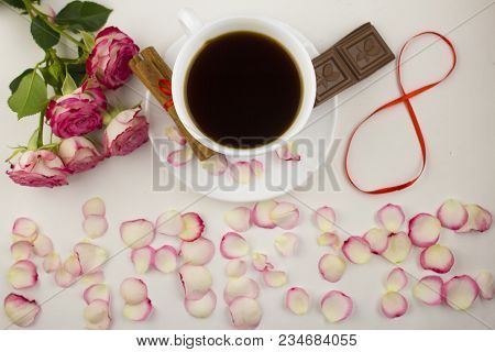 Inscription On The Eighth Of March From Rose Petals, Coffee, Cinnamon, Chocolate On A White Backgrou