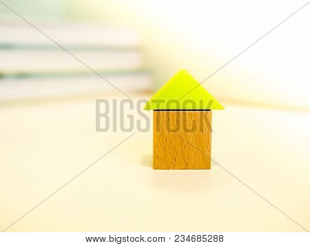 Blocks - Close Up Small Blocks House With Stack Of Book Background