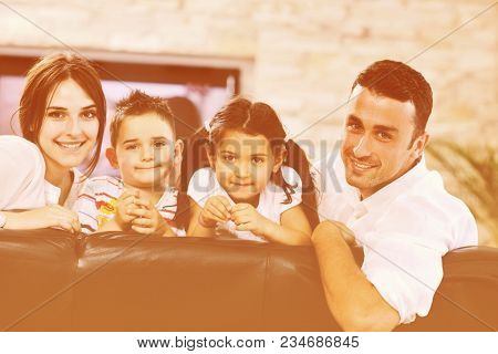happy young family relax and have fun at modern home indooor