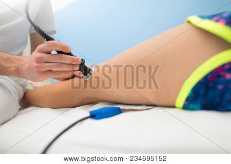 Physiotherapist Performs Treatment With Tecar Therapy In Spa