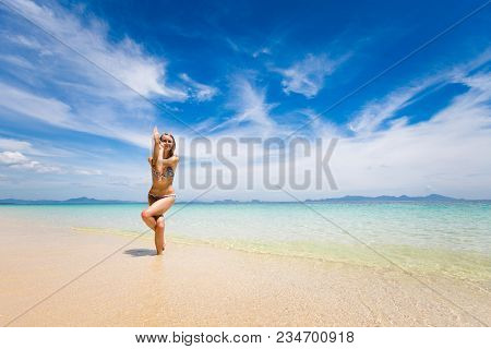 Tropical Summer Yoga Session On Beautiful Sunset Beach, Koh Kradan Island In Thailand. Vriksha Asana