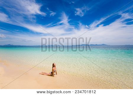 Tropical Summer Yoga Session On Beautiful Sunset Beach, Koh Kradan Island In Thailand. Vriksha Asana