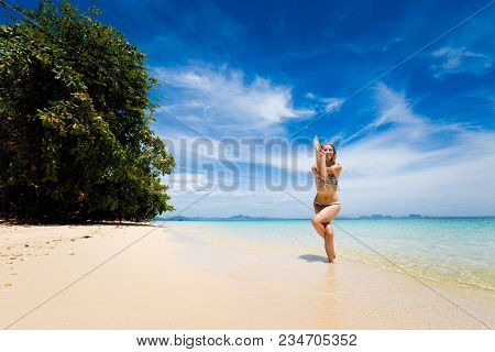 Tropical Summer Yoga Session On Beautiful Sunset Beach, Koh Kradan Island In Thailand. Vriksha Asana