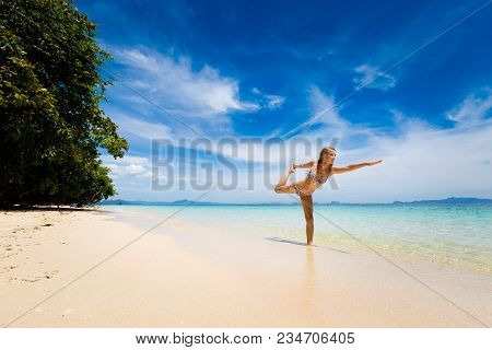 Tropical Summer Yoga Session On Beautiful Sunset Beach, Koh Kradan Island In Thailand. Vriksha Asana