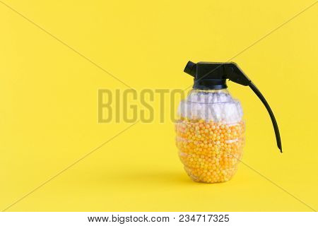 Hand Grenade Toy Bomb Full Of Foam Balls In Form Of Beer And Foam Minimal Creative Concept. Space Fo