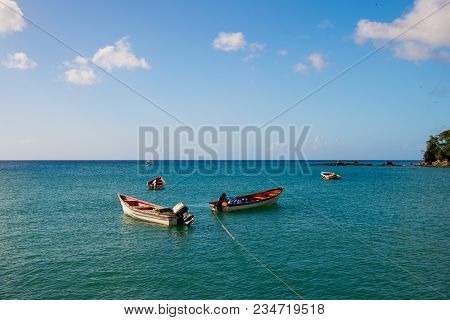 Fishing Boats In Blue Sea On Sunny Sky In Castries, St.lucia. Summer Vacation In Tropics. Fishing An