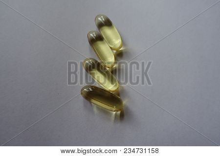 Translucent Yellow Dietary Supplement Capsules (fish Oil)